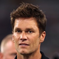 Aug 26, 2023; Arlington, Texas, USA; Former NFL player Tom Brady on the field before the game between the Dallas Cowboys and the Las Vegas Raiders at AT&amp;T Stadium. Mandatory Credit: Tim Heitman-USA TODAY Sports
